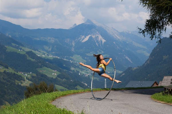 Cyr wheel split jump with mountains