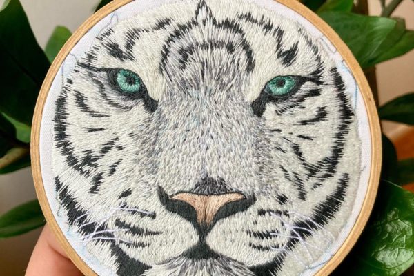 An embroidery of a white tiger