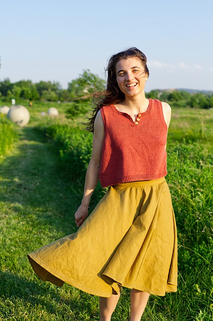Hayst is a Henley-neck knit tank top, shown here with the neck buttons open