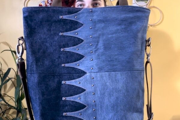 a bucket tote made of two colours of denim