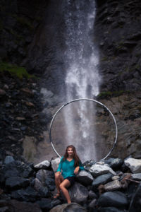 Posing in front of cyr wheel and waterfall