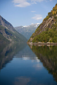 Mountain reflection in Geiranger fjord