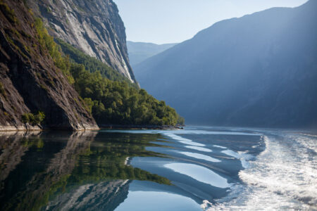 Reflecting boat wake in Geiranger Fjord