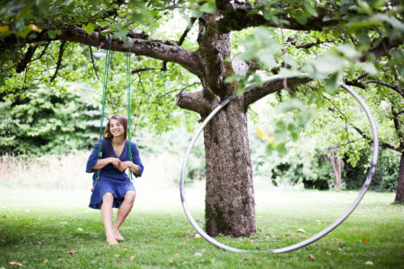 Under the apple tree on a swing with my Cyr Wheel