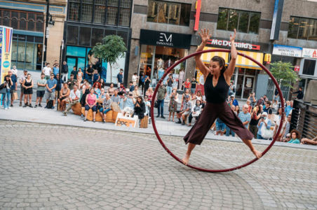 Spinning in a Cyr wheel in front of a crowd
